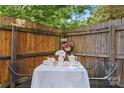 Cozy outdoor patio with a garden view, perfect for relaxing or entertaining at 656 Garden District Dr, Charlotte, NC 28202