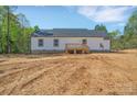 Exterior view showcasing the back of the home with a walkout basement at 1119 Stanback Rd, Chester, SC 29730
