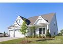 Attractive exterior view highlighting the architectural details and well-manicured landscaping at 13279 Arnold Palmer Cir # 867, Lancaster, SC 29720