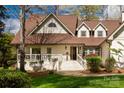 Inviting home featuring a covered porch, well-kept lawn and stone walkway at 16 Catawba Ridge Ct, Clover, SC 29710