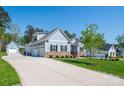 Beautiful home featuring a long driveway leading to multiple garages at 4594 N Wynswept Dr, Maiden, NC 28650