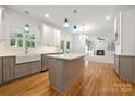 Spacious kitchen featuring a central island, modern appliances, and ample cabinet space, perfect for cooking and entertaining at 6201 Creola Rd, Charlotte, NC 28270
