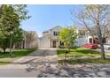 A well-kept two-story home with a driveway, lawn, and an inviting front entrance at 8917 Chalkstone Rd, Charlotte, NC 28216