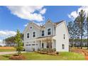 Charming two-story home with a two car garage, manicured lawn and lovely landscaping at 9913 Jack Nicklaus Dr # 908, Lancaster, SC 29720