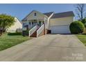 Exterior shot of a single-Gathering home featuring a driveway and front yard at 1488 Meadow Glen Ln, Rock Hill, SC 29730