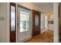 Welcoming foyer with hardwood floors and decorative glass doors, offering a glimpse of the interior at 2199 Lookout Pt, Rock Hill, SC 29732