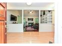 Inviting living room featuring hardwood floors, neutral paint, and an open floor plan at 9600 Lockhorn Ct, Mint Hill, NC 28227