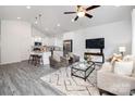 Bright living room featuring open concept floor plan with modern decor and stylish furniture at 1149 Thayer Glen Ct, Charlotte, NC 28213