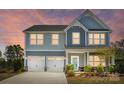 Charming two-story home with a well-manicured lawn, a two-car garage, and excellent curb appeal at 1578 Whitman Ct, York, SC 29745