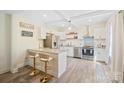 Bright, well-appointed kitchen with modern appliances, sleek countertops, and stylish bar stool seating at 600 3Rd St, Spencer, NC 28159