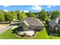 Spacious backyard with a large patio and manicured lawn, perfect for outdoor entertaining and relaxation at 630 Deberry Holw, Rock Hill, SC 29732