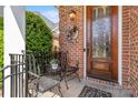 Inviting front porch with seating area, decorative wreath, and a beautifully crafted front door at 962 Blakeley Walk, Rock Hill, SC 29732