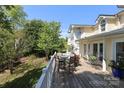 Enjoy outdoor dining and relaxing on this wooden rear deck at 17333 Saranita Ln, Charlotte, NC 28278
