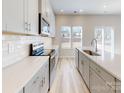 Bright kitchen featuring sleek countertops, stainless steel appliances, and modern cabinetry at 1222 Morehead Dr, Salisbury, NC 28144