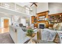 Inviting living room with a stone fireplace, built-in bookshelves, and an open layout at 401 Yorkfield Dr, Shelby, NC 28150