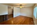 Bright living room with hardwood floors and a ceiling fan at 4623 Monmouth Dr, Charlotte, NC 28269