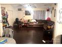 Bright living room with hardwood floors, neutral walls, and plenty of space for the whole Gathering at 605 Brookside Dr, Monroe, NC 28110