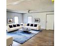 Bright living room featuring neutral colors, plush seating, and modern decor at 828 Long Bow Rd, Salisbury, NC 28144