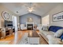 Spacious living room featuring a vaulted ceiling, fireplace, and comfortable seating at 1252 Spring View Ct, Rock Hill, SC 29732