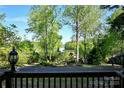 Scenic view from the property overlooking the tranquil lake, framed by lush trees and greenery at 1042 Jackson Rd, Fort Lawn, SC 29714