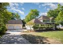 Charming home featuring an oversized two-car garage and well-maintained lawn at 106 Friendfield Dr # B, Fort Mill, SC 29715