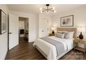 Stylishly decorated bedroom featuring modern lighting, hardwood floors, and neutral décor at 905 Gantt St, Kings Mountain, NC 28086