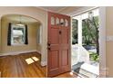 Inviting entryway with a view into a room with hardwood floors at 1944 Garibaldi Ave, Charlotte, NC 28208