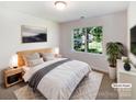 Cozy bedroom featuring a large window and a comfortable king-sized bed at 2405 Kalis Pl, Charlotte, NC 28262