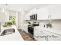 Well-equipped kitchen featuring stainless steel appliances, sleek countertops, and ample cabinet space at 2414 Morgan Hills Dr # 296P, Albemarle, NC 28001