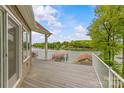 Spacious deck offering serene water views and ample room for outdoor relaxation at 376 Oak Tree Rd # 37, Mooresville, NC 28117