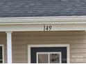 Close-up of the house number shows 