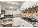 Kitchen features stainless steel appliances, granite countertops, and stylish backsplash at 1600 Sharon W Rd # 8, Charlotte, NC 28210