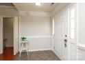Welcoming entryway with neutral paint and tile flooring at 1002 Christobal Ct, Indian Trail, NC 28079