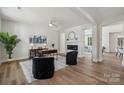 Open office features wood floors, modern fireplace, and comfortable seating at 1112 Allman Ext, Mount Pleasant, NC 28124