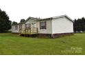 Cozy one-story house with a front porch, ideal for relaxing outdoors at 234 Olin Loop, Olin, NC 28660