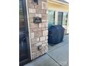 Shows the house number on the stone pillar by the covered patio at 2355 Villa Oaks Ct, Gastonia, NC 28054