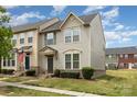 Townhome with charming curb appeal, featuring well-maintained landscaping at 1720 Fleetwood Dr, Charlotte, NC 28208