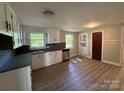 Bright kitchen features wood floors, sleek countertops and modern appliances at 2703 34Th Street Ne Pl, Hickory, NC 28601