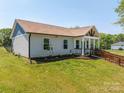 Inviting home showcasing the walkway, and green space that enhances curb appeal at 3121 Suffolk Dr, Shelby, NC 28152