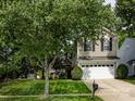 Lovely two-story home with a well-manicured front yard at 5304 Silabert Ave, Charlotte, NC 28205
