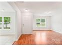 Bright living room with hardwood floors, fresh paint, and plenty of natural light at 759 Victory Gallop Ave, Clover, SC 29710
