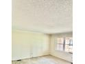 Bright living room with neutral walls and carpeted flooring, bathed in natural light at 127 Edgeway Rd, Mooresville, NC 28117
