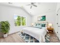 Inviting bedroom with a large window, comfortable bedding, and contemporary decor at 3056 Goble St, Gastonia, NC 28056
