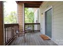 Cozy porch with seating, offering a relaxing outdoor space and neighborhood views at 3937 Arbor Ln # H, Charlotte, NC 28209