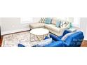 Bright living room with hardwood floors, stylish furniture and a decorative rug at 606 Childs St, Lincolnton, NC 28092