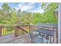Outdoor deck with chairs and table offering an outdoor space at 1032 Eagles Nest Ln, Indian Land, SC 29707
