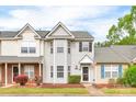 Charming townhome with well-maintained landscaping and a welcoming facade at 1032 Eagles Nest Ln, Indian Land, SC 29707