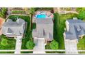 Aerial view of a home with a large backyard featuring a pool and lush greenery at 1215 39Th Ne Ave, Hickory, NC 28601