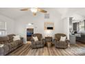 Inviting living room showcasing hardwood floors and light-filled, neutral walls to complement the bedroom at 505 Tea Olive Ct, Rock Hill, SC 29732