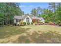 Inviting single-Gathering home with well-kept lawn, mature trees, and blooming flower beds at 812 Timber Creek Dr, York, SC 29745